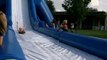 Going Down The Big Inflatable Slide - Again. Terrance has more fun sliding down the inflatable water slide.
