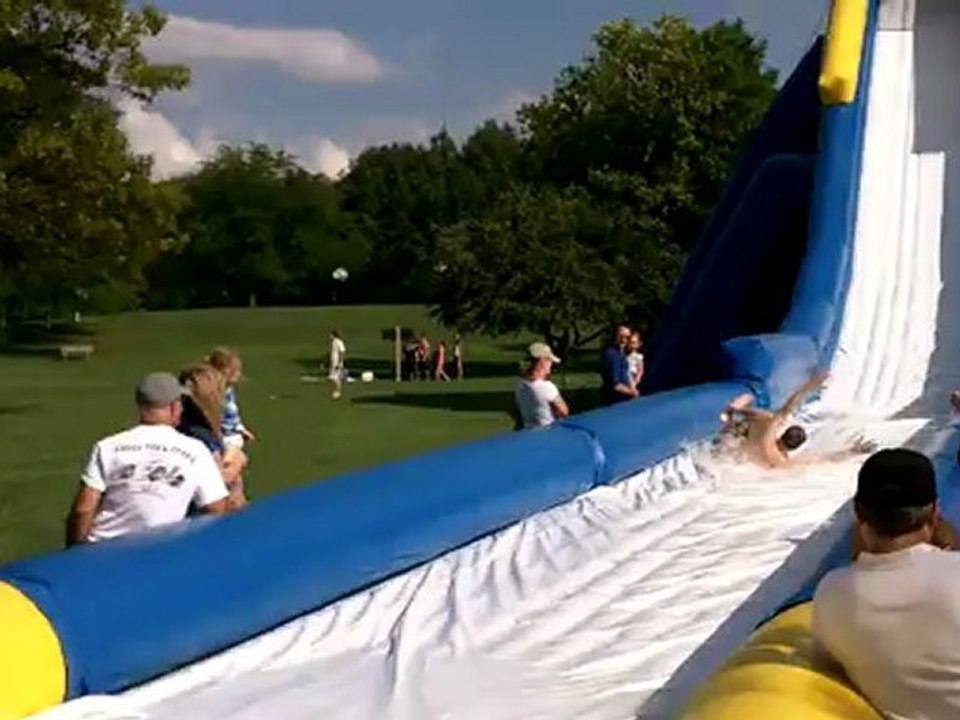 Going Down The Big Inflatable Slide - Terrance slides down the amazing water slide. Stoney Creek Metro Park. Amusement ride.