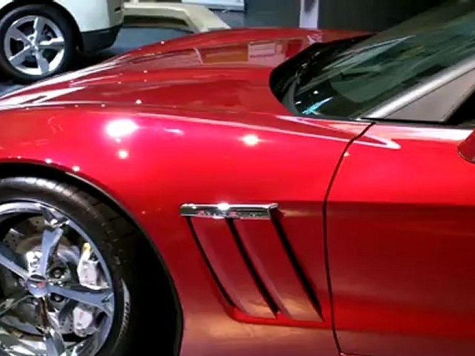 2011 Sports Car - This brand new red  Corvette Grand Sport Convertible gets 16 miles per gallon and 26 mpg on the highway. Sports Car. Transportation.