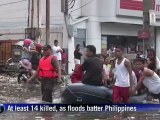 Philippine floods worsen as death toll hits 14