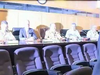 King Juan Carlos of Spain trips over at military meeting