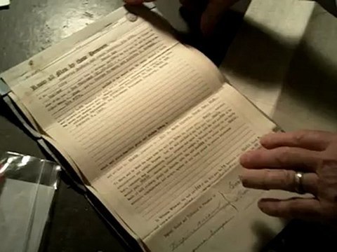 Purchase Agreement .. Mr. Hermann shows the original Partnership Agreement, and Purchase Agreement.