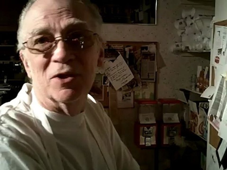 Remembering The Old Days .. Mr. Hermann shows Terrance old photos of the bakery. Hermann's Bakery. Royal OakOak, Michigan. Small business.