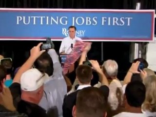 Obama says too many still jobless; Romney takes aim