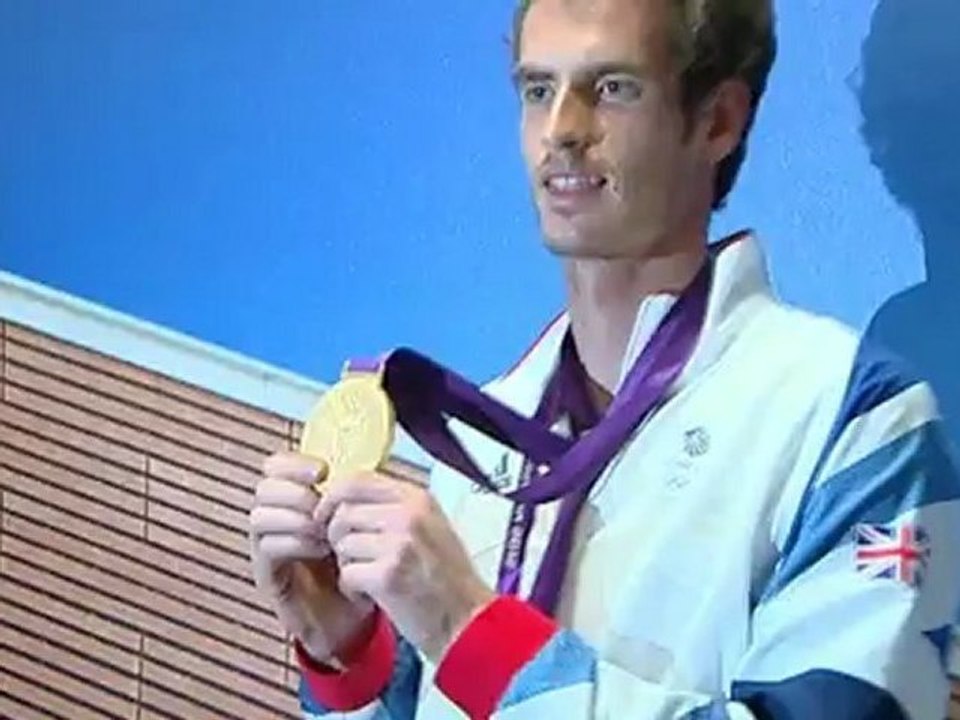 Andy Murray celebrates his Olympic gold