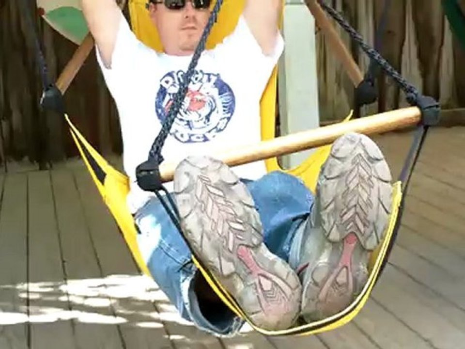 Resting At The Festival - Relaxing in a Sky Chair at the Michigan Renaissance Festival in Holly Michigan.  Independent business.