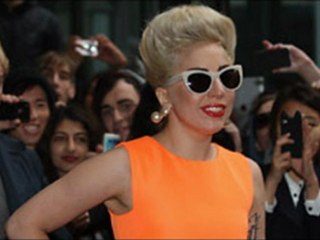 Lady Gaga and Boyfriend Taylor Kinney Share Smooch While Skinny-Dipping