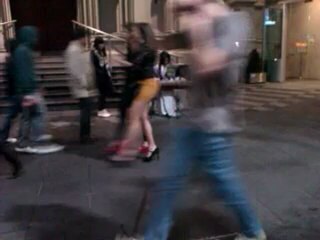 asian girl playing in the streets of Melbourne