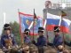 Cossacks march to Paris to celebrate Russia battle victory