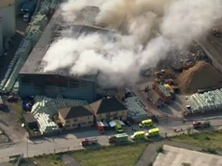 Two hundred firefighters tackle massive blaze in east London