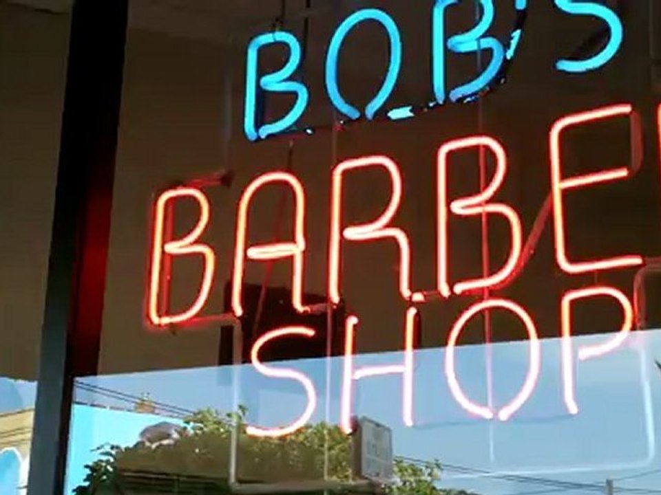 Old Fashioned Barber Shop - Bob's Barber Shop in Roseville, Michgian. Small shop with 2 barber chairs. Independent business. Making a living.