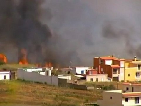 Forest fires kill two people in Spain