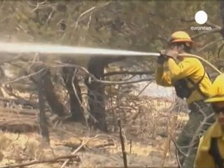 Homes are burned as wildfires rage in the US