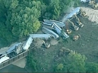 Train derails, cars plunge into Kansas river