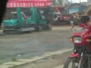 Overload: Man drives motorbike with eight passengers