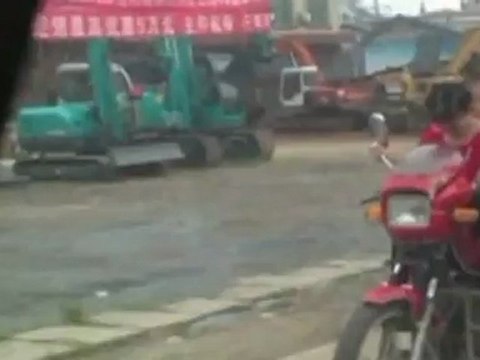 Overload: Man drives motorbike with eight passengers