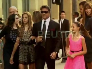 Stallone, Schwarzenegger and Van Damme hit red carpet for "The Expendables 2" premiere