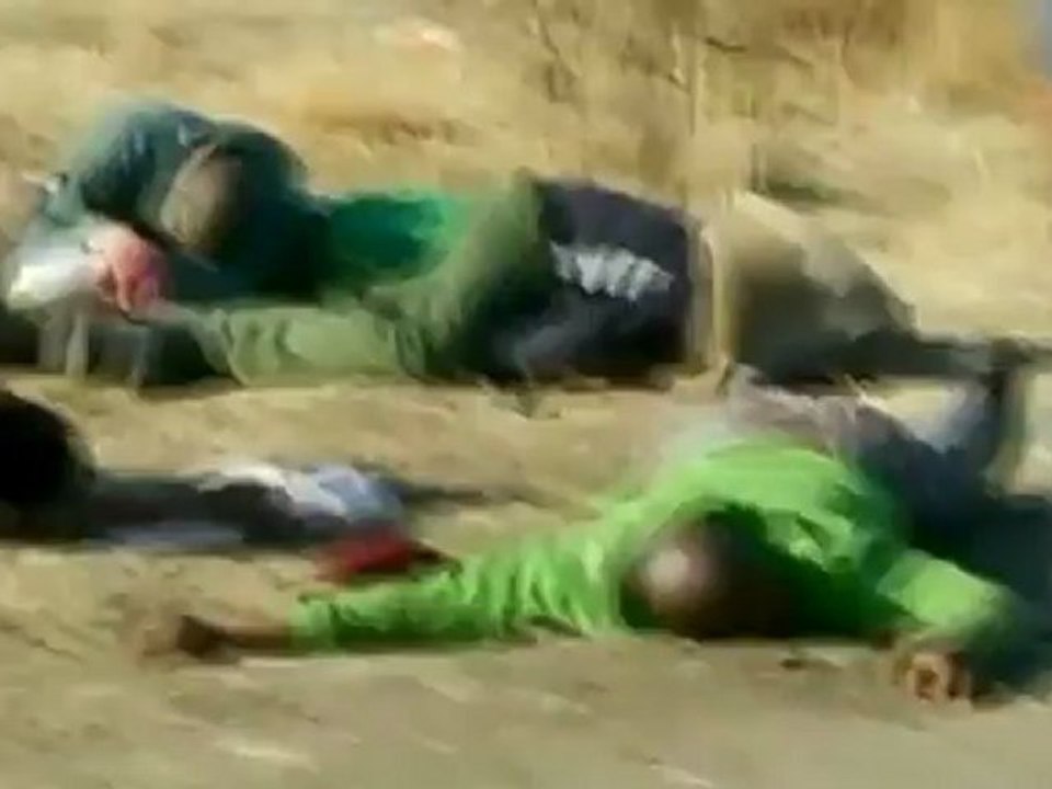 South African police fire on striking miners