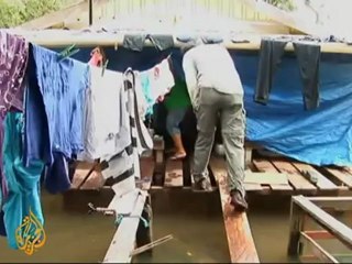 Waist deep in Brazil's flood-hit state