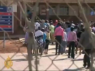 Families of S Africa miners search for missing loved ones