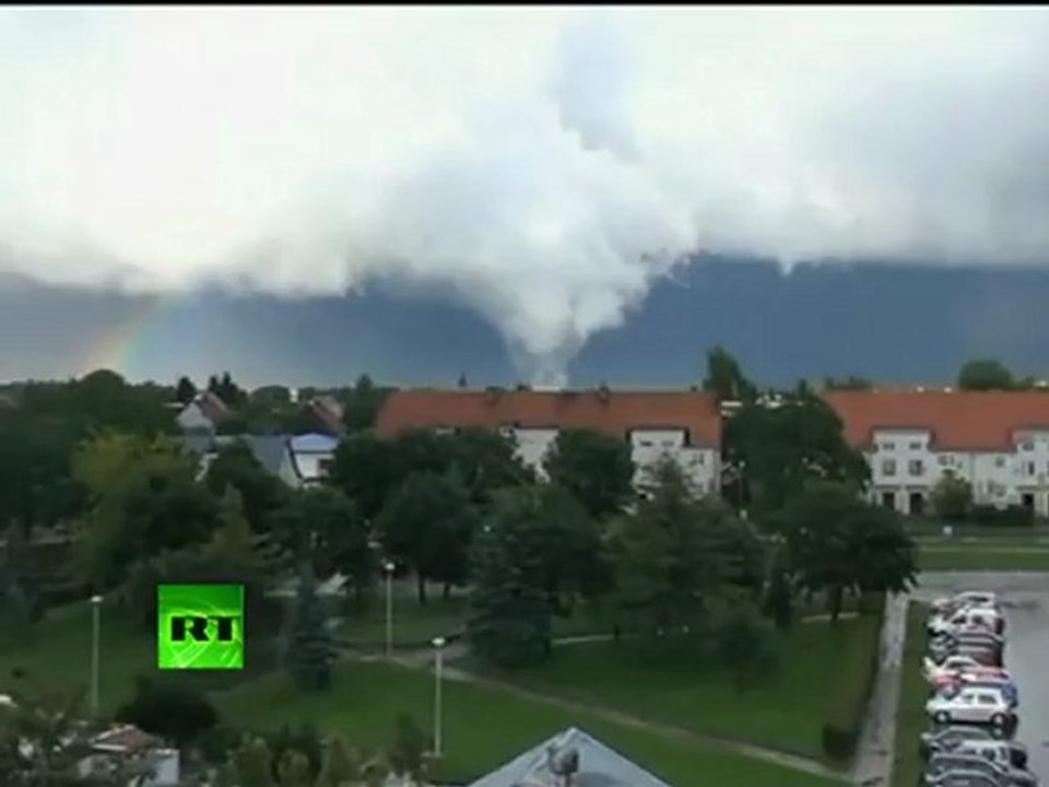 Poland tornado: Massive twister caught on camera as it churns over city