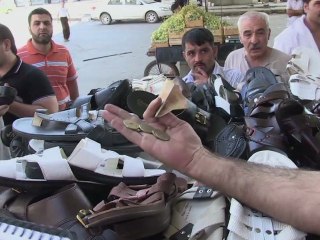 A Alep, la vie continue malgré les bombardements