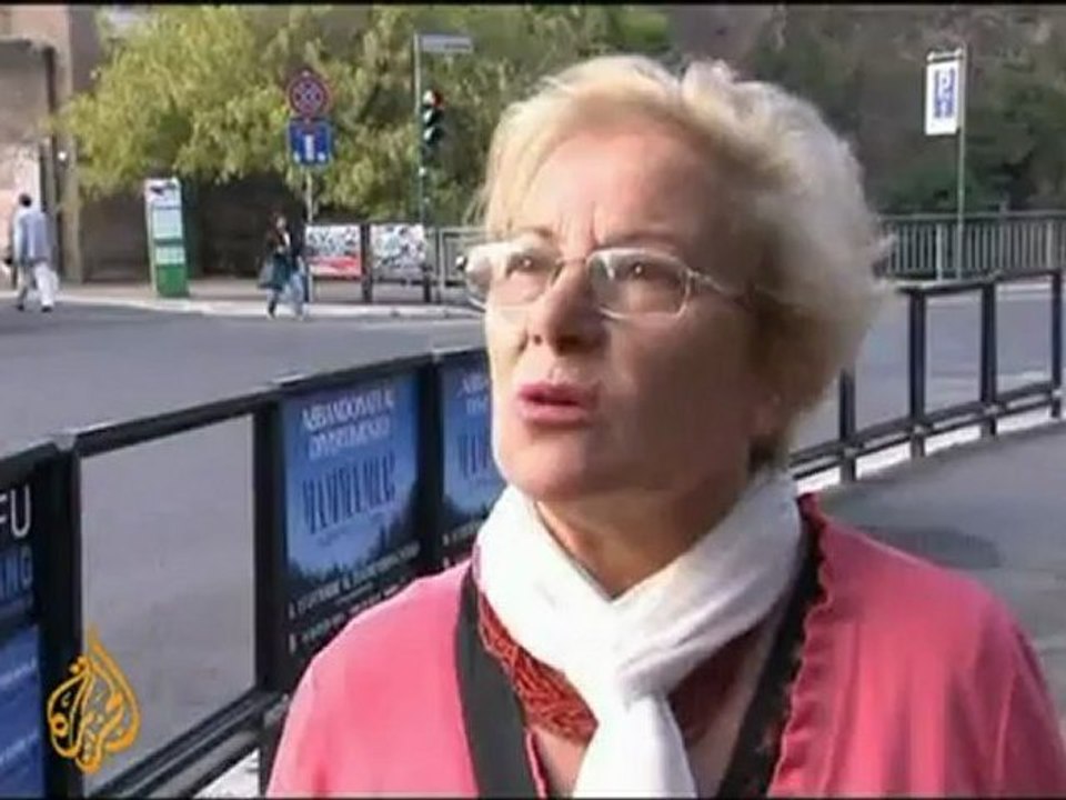 Berlusconi denounces Italy debt downgrade