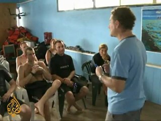 Honduras lures tourists by saving sharks