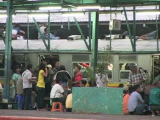 Indonesia lowers power lines to deter 'train surfers'