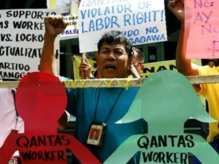 Qantas posts loss, cancels Dreamliner order