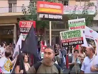 Sarkozy backs Greece amid protests