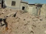 Syria فري برس  ادلب  حزانو اثار القصف على البلدة من الطائرات الحربية 23 8 2012ج1