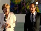 Hollande y Merkel buscan un frente común sobre Grecia