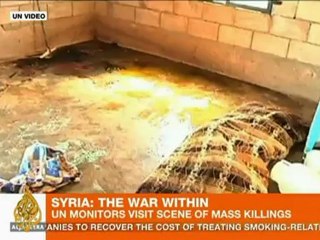 UN monitors smell 'burnt flesh' in Syria's Qubayr