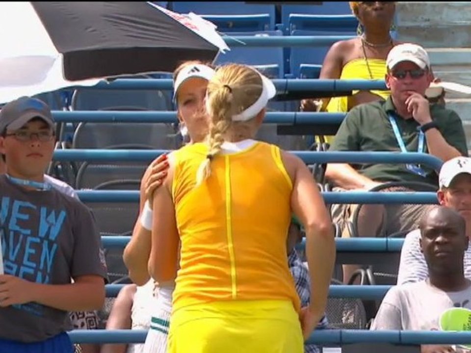 Kirlenko through as Wozniacki retires