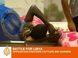 Libyan rebels inch toward the capital