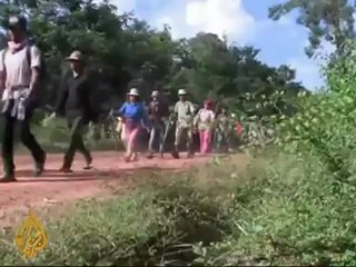 Cambodians fight illegal logging