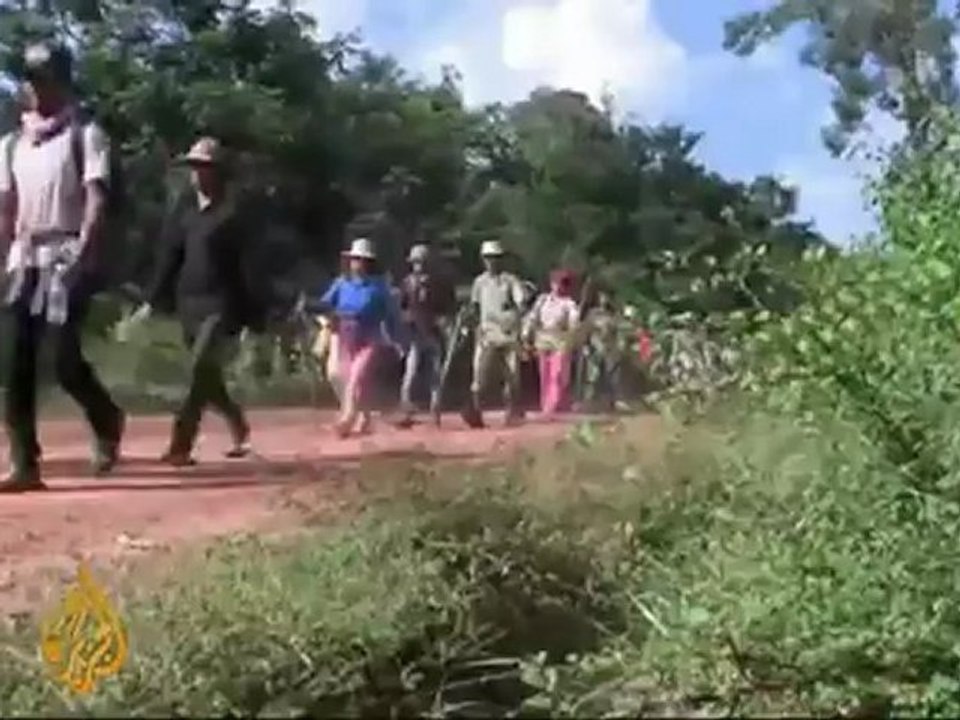 Cambodians fight illegal logging