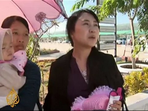 Clinton arrives in Myanmar on landmark visit