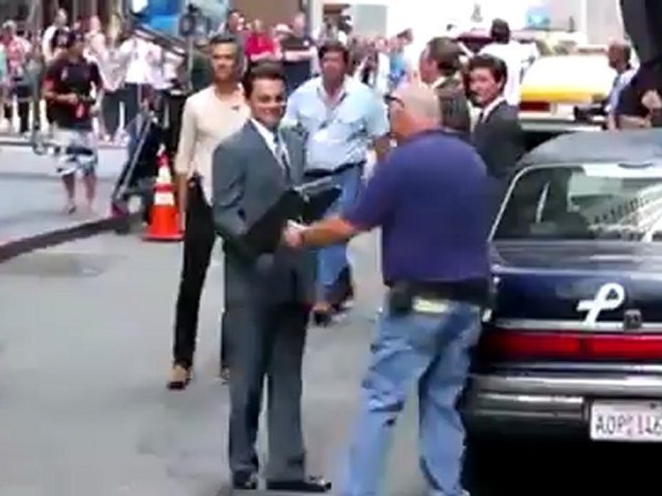 Leonardo DiCaprio is Debriefed on Set