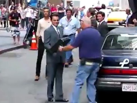 Leonardo DiCaprio is Debriefed on Set