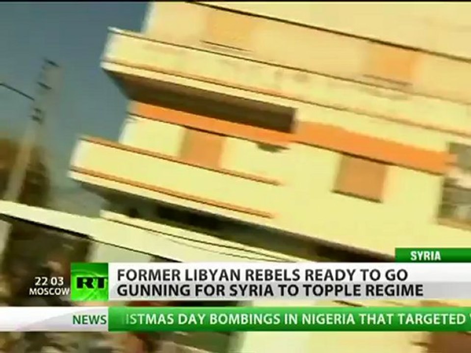 Libya rebels go gunning for Syria to topple Assad