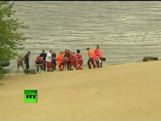 Video: Biplane crashes at air show, plunges into river in Poland