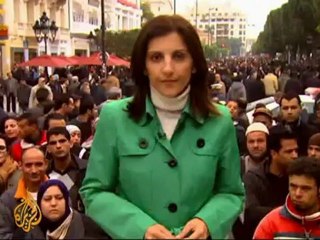 Tunisians honor anniversary of revolution