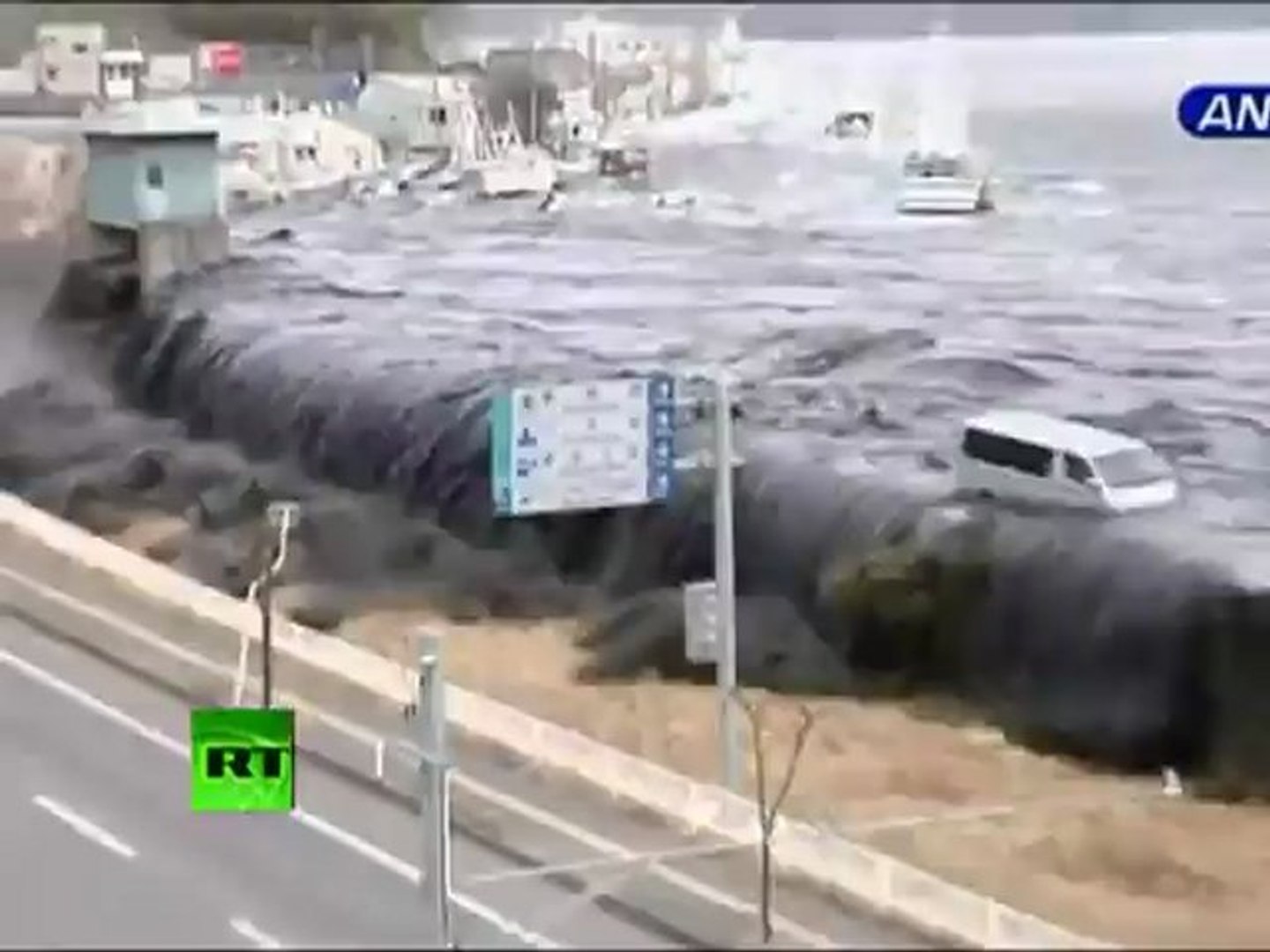 New dramatic video Tsunami wave spills over seawall, smashes boats, cars