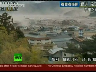 Japan Earthquake: Helicopter aerial view video of giant tsunami waves
