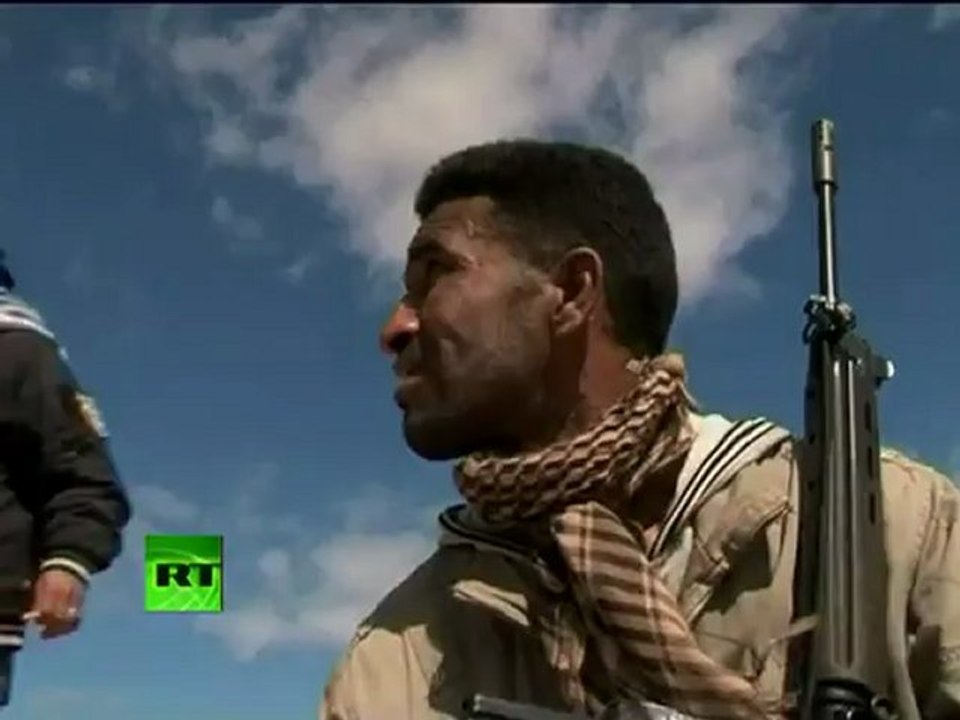 Video of Libya rebels under fire as Gaddafi airstrikes reported