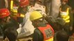 Scores trapped in Pakistan building collapse