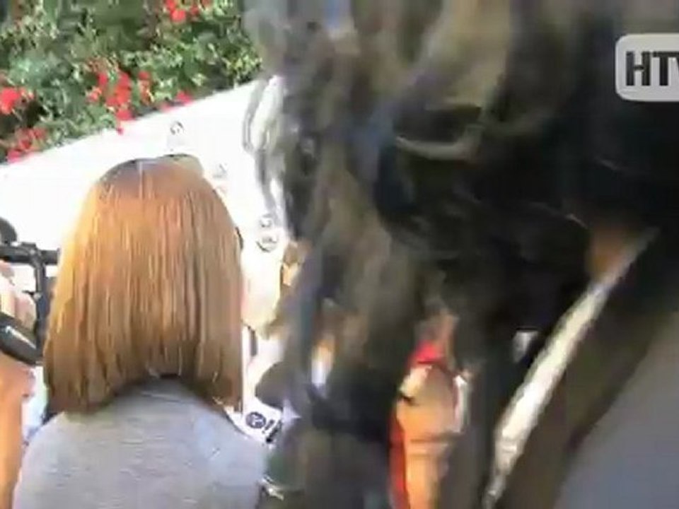 Russell Brand Walks Off The Red Carpet.