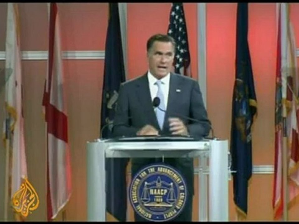 Republican candidate Mitt Romney booed at civil rights group meeting